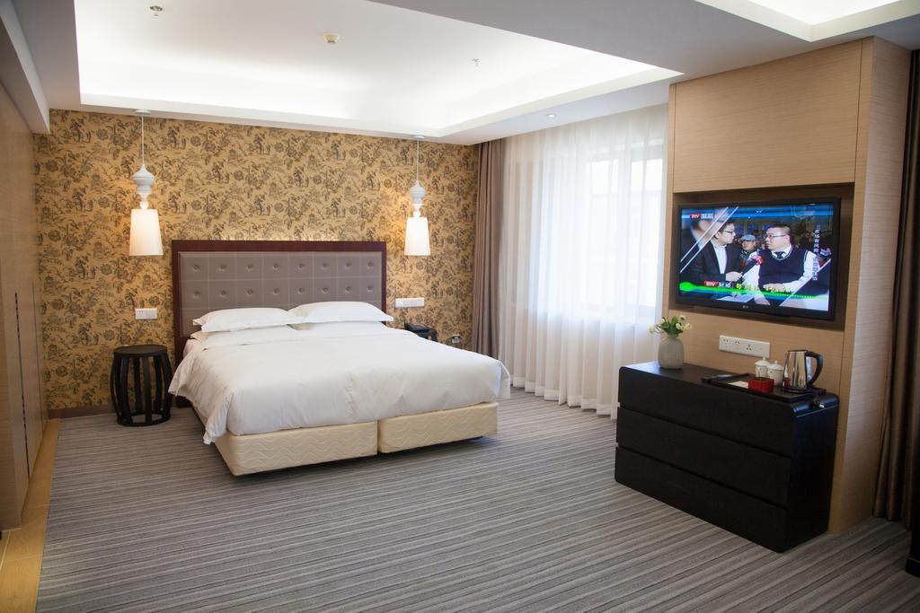 Traveler Inn-Hepingli Пекін Номер фото