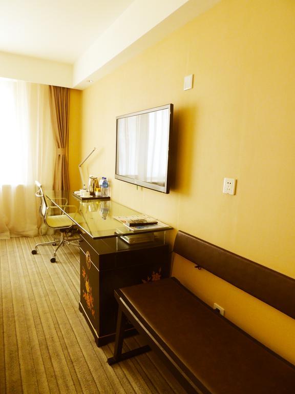 Traveler Inn-Hepingli Пекін Номер фото