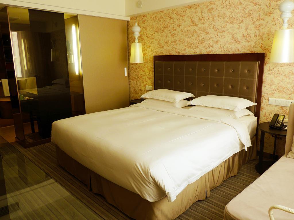 Traveler Inn-Hepingli Пекін Номер фото